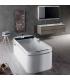 Glossy white Novellini Divina F whirlpool bath with taps